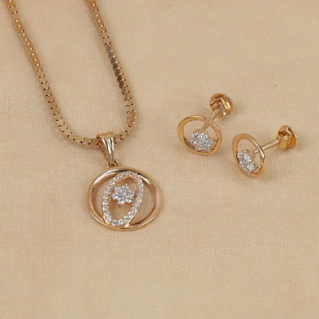 Sleek Star Gold Plated Pendant and Earrings Set